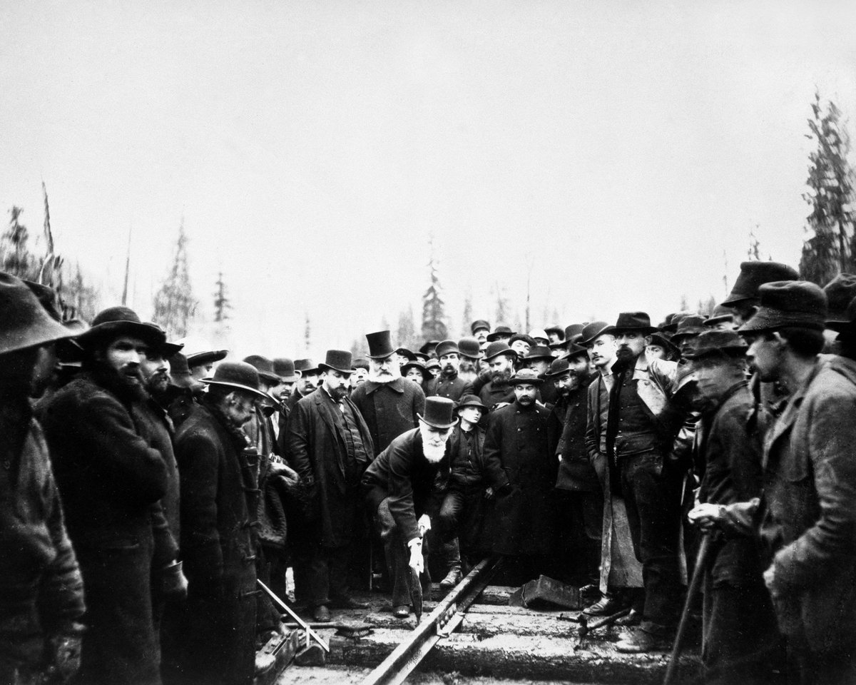 CPKCrail's tweet photo. 131 years ago Donald Smith drove the #LastSpike of Canada's first transcontinental railway, physically uniting Canada #ThisDayinHistory https://t.co/cTmSltxV1k