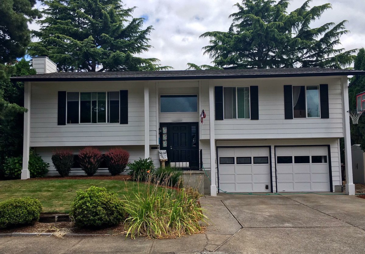 New black fascia gutters and downspouts on this home in Rock Creek, Oregon. #HillsboroGutters #RockCreek