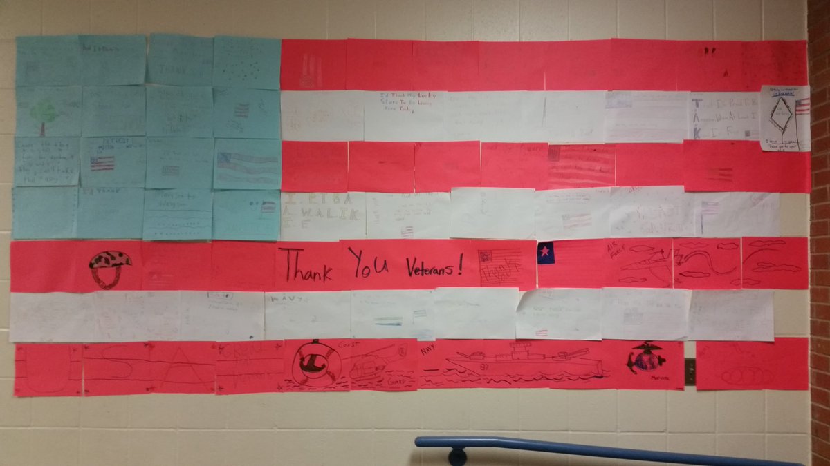 MrWestgard's tweet photo. Getting ready for Veteran's Day! Students and staff working together to create a display of gratitude. #GWGreats @elizabethjosel1 https://t.co/dvADZLa0cf