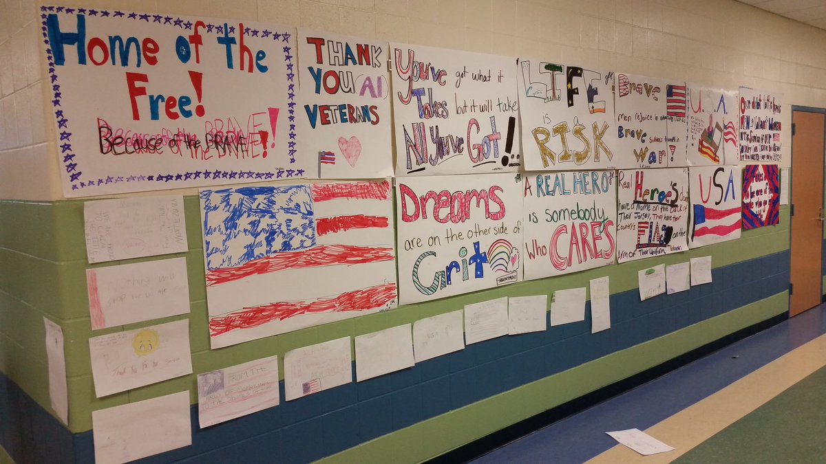 MrWestgard's tweet photo. Getting ready for Veteran's Day! Students and staff working together to create a display of gratitude. #GWGreats @elizabethjosel1 https://t.co/dvADZLa0cf