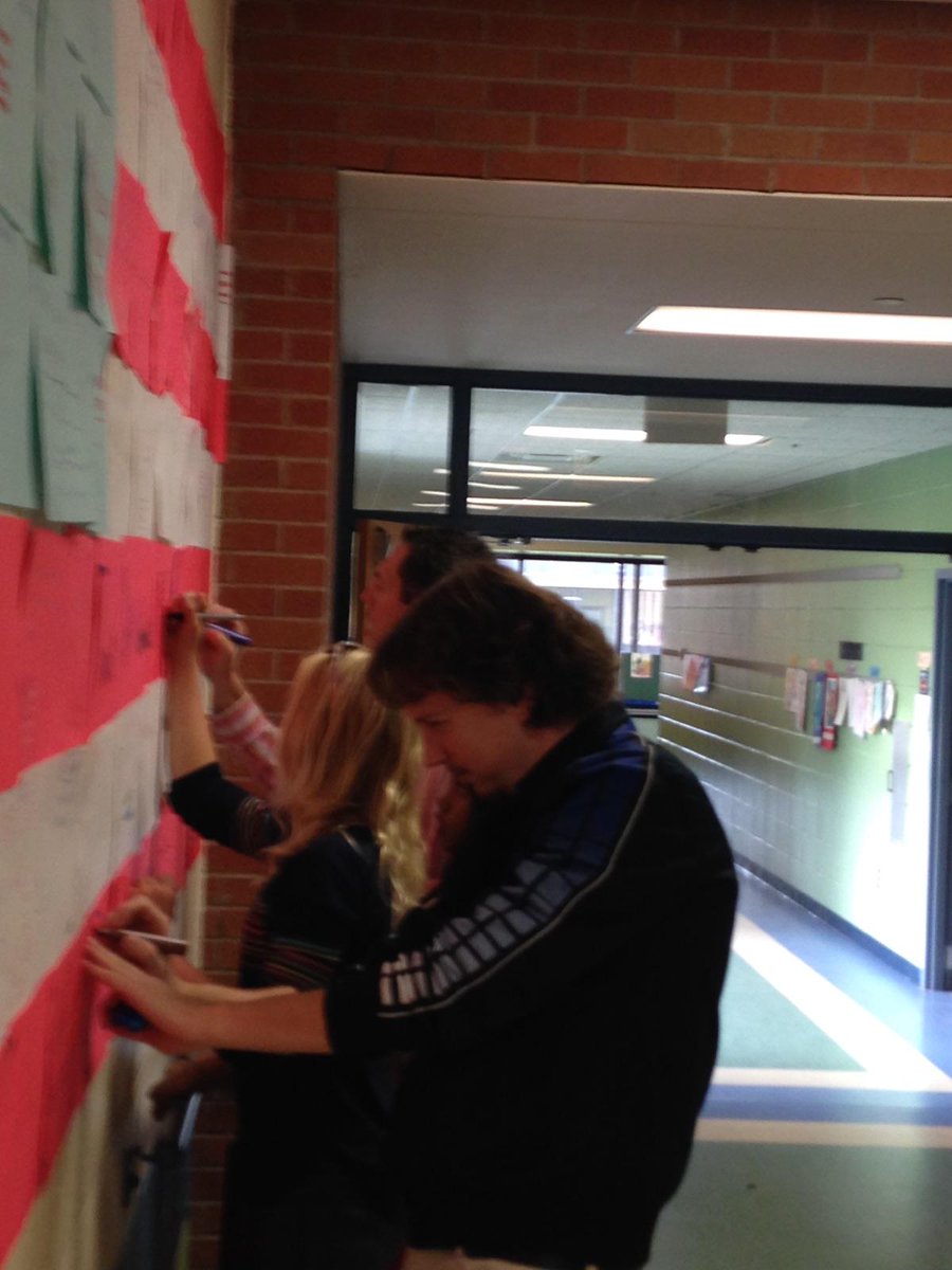 MrWestgard's tweet photo. Getting ready for Veteran's Day! Students and staff working together to create a display of gratitude. #GWGreats @elizabethjosel1 https://t.co/dvADZLa0cf