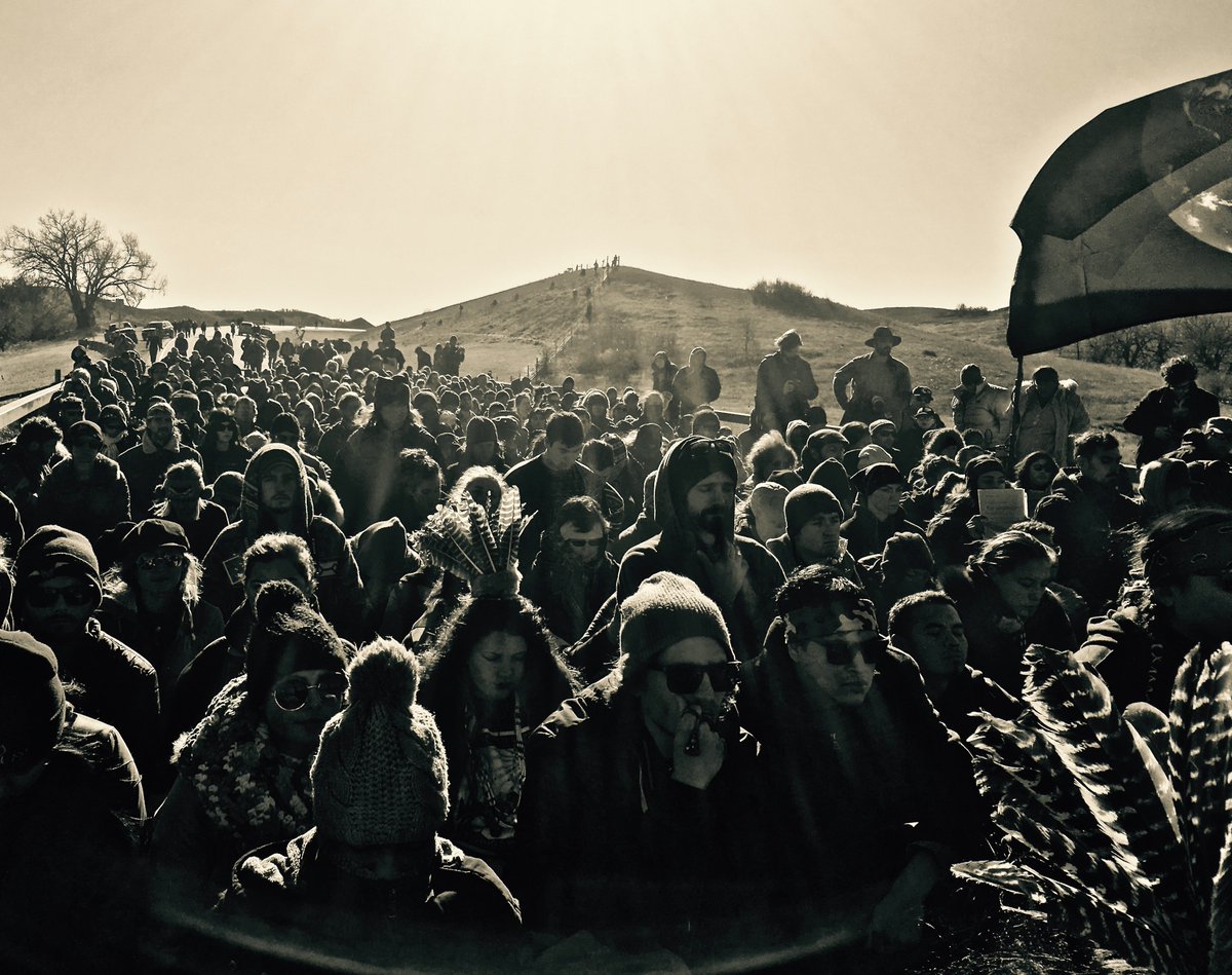 CreeClayton's tweet photo. RT!  #StandingRock - Youth led prayerful action- holding prayer &amp; sitting silent on hwy1806 police barricade https://t.co/Apiu0DW5H3 #NoDAPL https://t.co/OzvnIaezKt