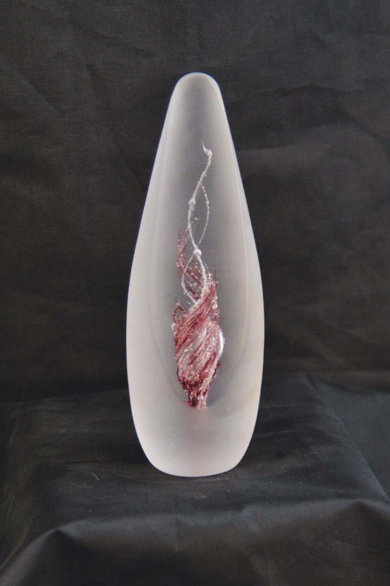 Beautiful paperweights made with a small amount of cremated ash. Visit langhamglass.co.uk for more information.