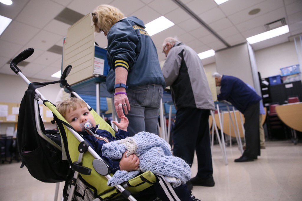 FotosByFong's tweet photo. Grandson reaches for  grandma's hand during voting @FotosByFong of @PDphotostaff #Election2016  #Vote2016 #VotingDay https://t.co/iuEloaWw85