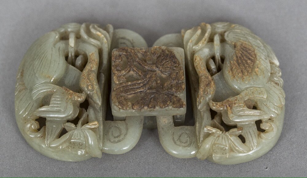 will_axon's tweet photo. A Chinese carved and pierced russet and celadon glazed belt buckle - £1,800 https://t.co/mJ0L6YsNgp
