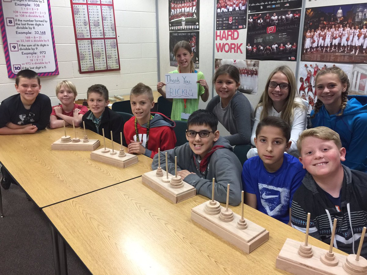 Thanks dad for making our Tower of Hanoi puzzles!  Kids are enjoying it, especially the second from right in front! @LGMSWolves