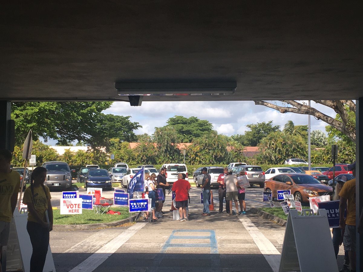 tariqnasheed's tweet photo. So suspected racist Trump supporters in Coral Springs Florida are blocking entrances to the polls &amp; using voter intimidation #ElectionDay https://t.co/yaA86Tcbu2