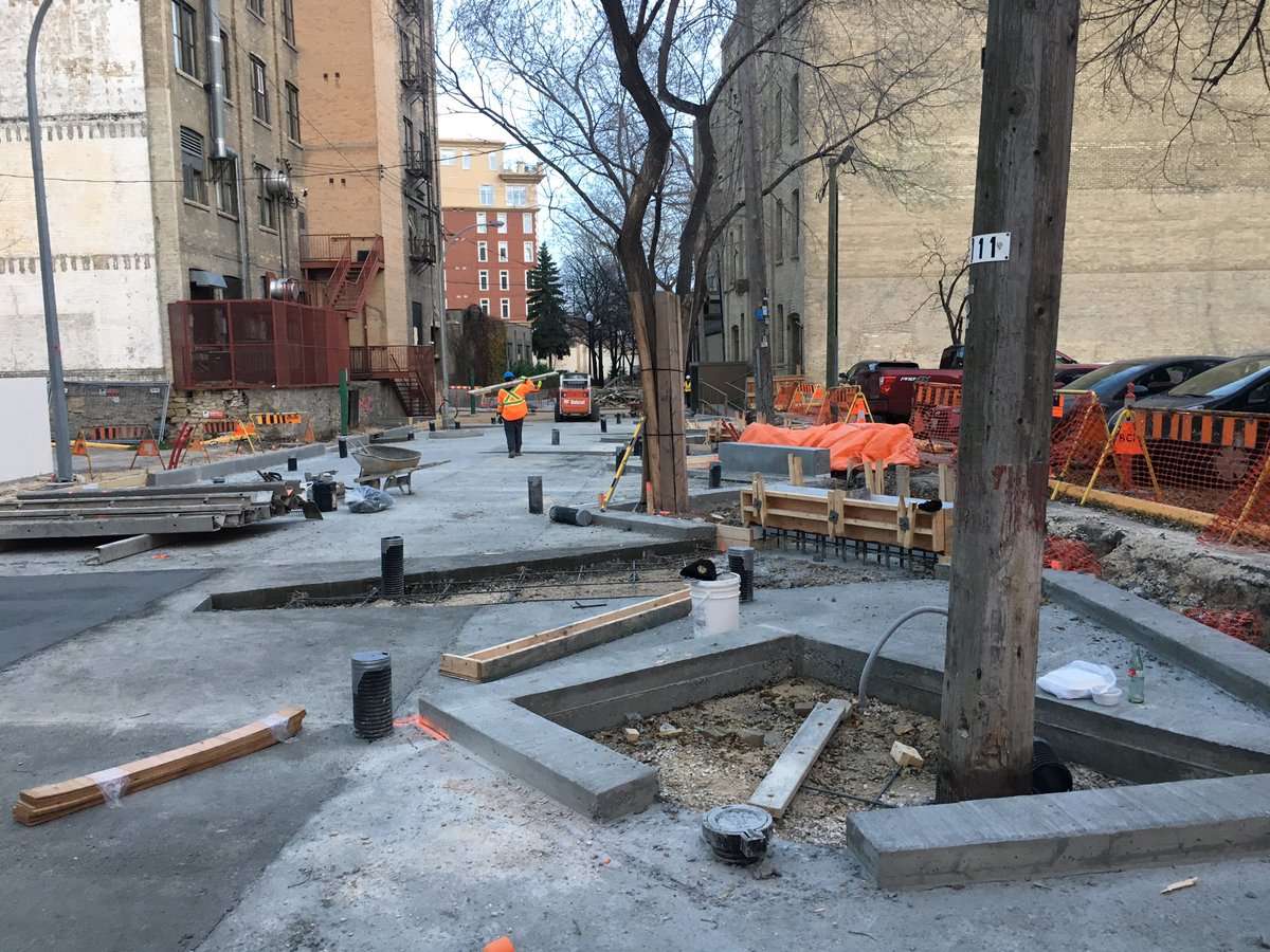 Winnipeg's first woonerf and an urban laneway redevelopment, taking shape in the Exchange District.