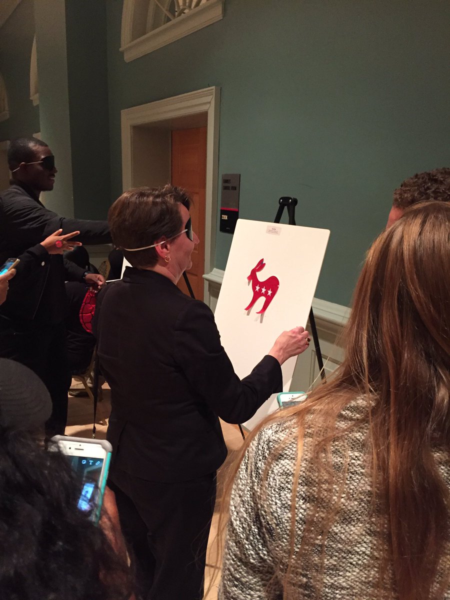 bsosumd's tweet photo. BSOS Associate Dean Katherine Russell tries her hand at pin the tail on the donkey while we wait for more returns #UMDpolitics https://t.co/RJp5Kgxyaq