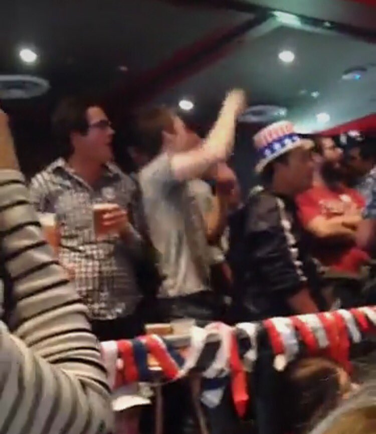 SimoneFoxKoob's tweet photo. Sydney Uni bar erupting with handful of Trump supporters shouting "lock her up", "build a wall", "drain the swamp", "grab her by the pussy" https://t.co/7wzNF7bc0L