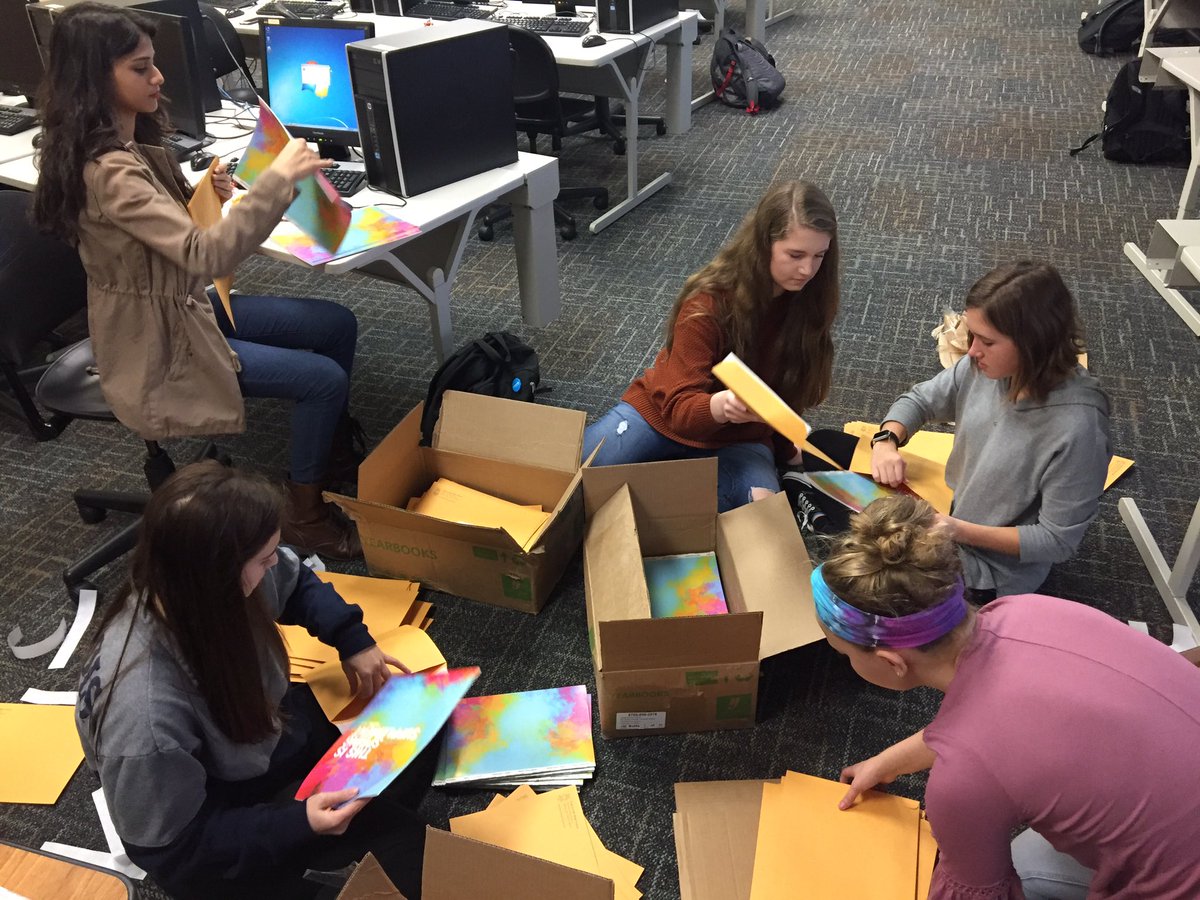 Yearbook students worked hard today to send out our supplements to last year graduates!