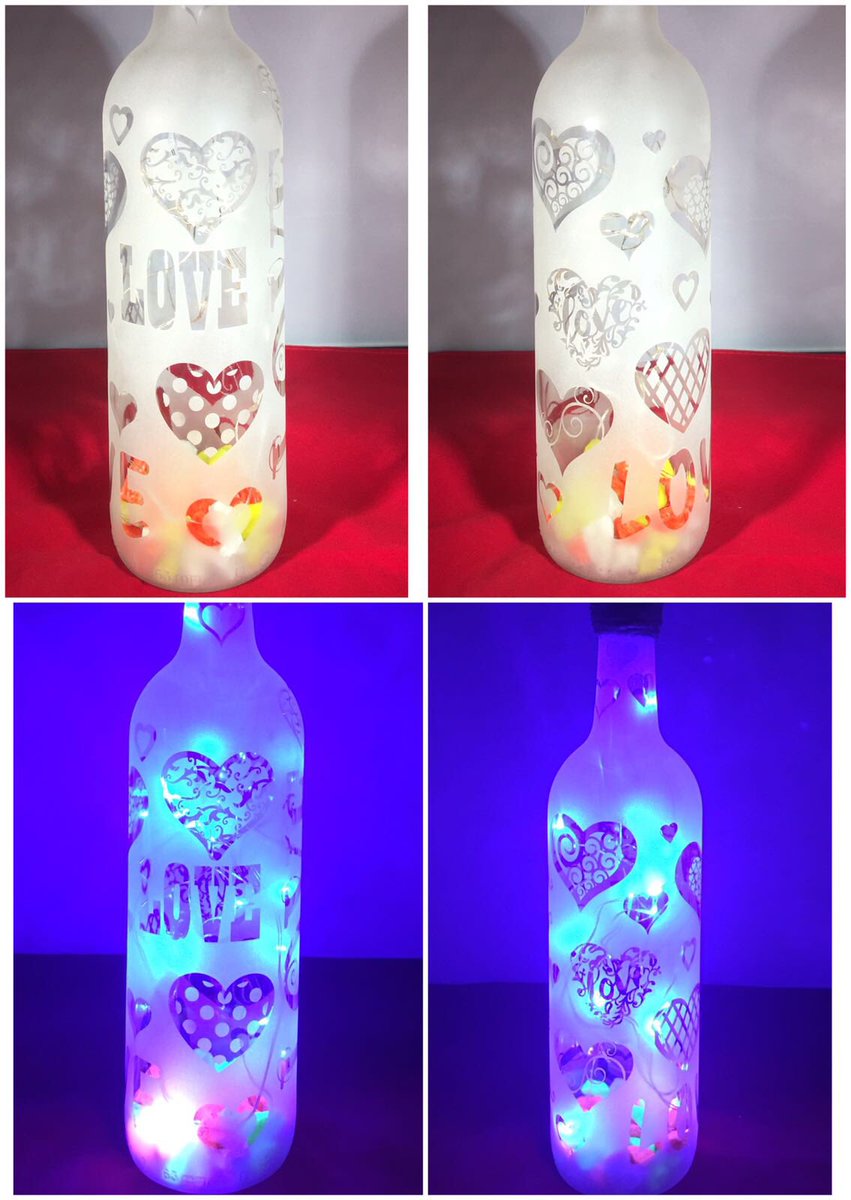 monkeydebris_c's tweet image. Frosted upcycled love bottle light. With blue LED&apos;s and coloured stones. Bespoke one of a kind design. Beautiful.