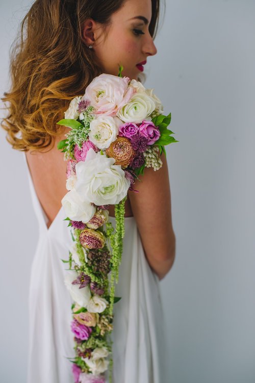 We love this over-the-shoulder design by New Jersey Chapel Designer <a href="/WileEvents/">Wile Events</a>! (#floraandfaunafashionshow | pic: <a href="/Amandadumophoto/">Amanda Dumouchelle</a>)