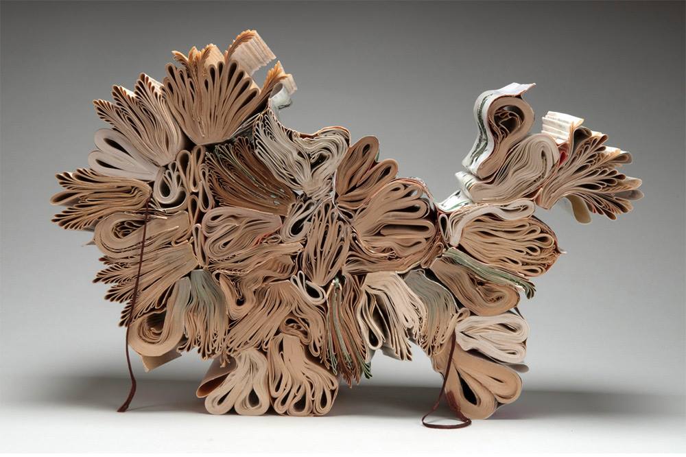 mymodernmet's tweet image. These organically-shaped sculptures are made of books, created by Jacqueline Rush Lee
