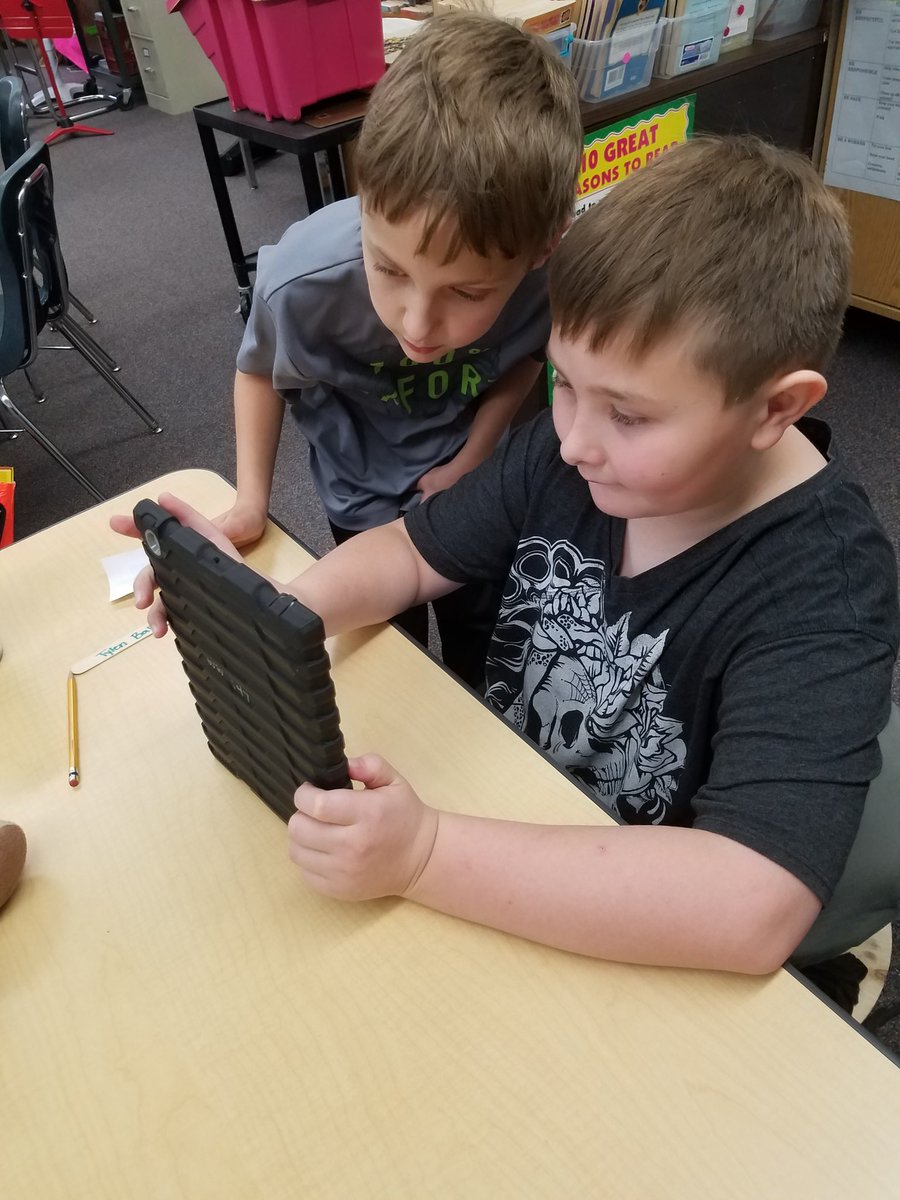 MsZieman's tweet photo. Trying to figure out a puzzle to see if we find another clue!! #plsas #breakoutedu #teamworktime https://t.co/6nHlAjrrFL