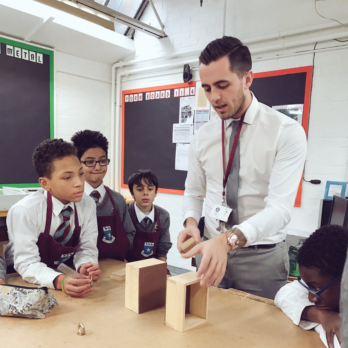 TechnologySJC's tweet image. Mr Henry showing the Year 8 Students how to use the Cork block efficiently!