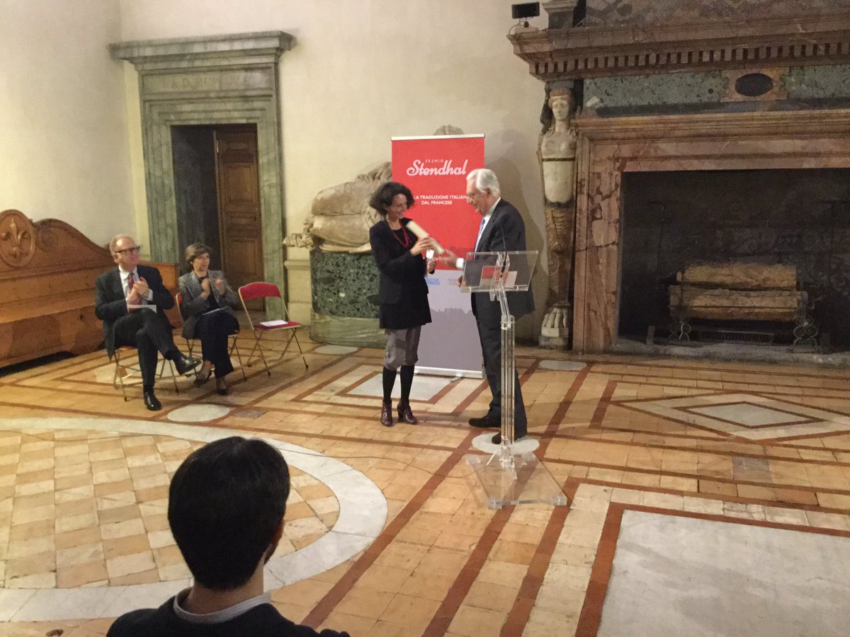 FranceenItalie's tweet photo. #prixstendhal. Ludovico Ortona remet la mention "Jeune" à Camilla Diez pour la traduction de Tram 83 de F. Mwanza Mujila https://t.co/vgBPoh2Q8c