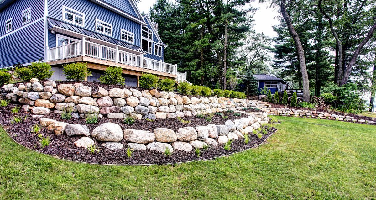 ProMowLawnCare's tweet photo. Pro-Mow Making Landscape's Great Again. 
#FlashbackFriday #landscapedesign #westmichigan https://t.co/HqpWaVuDf5
