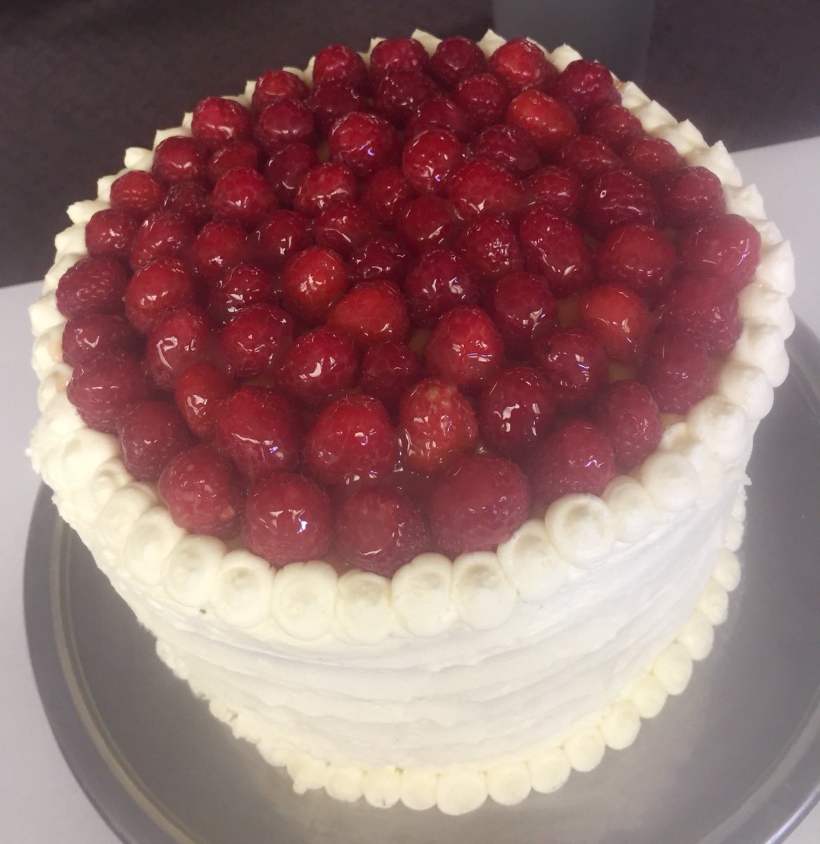 Another masterpiece by our bakers … four-layer Lemon Raspberry Cake!  #YEGfood #YEGbaking #HaveYourCakeAndEatItToo