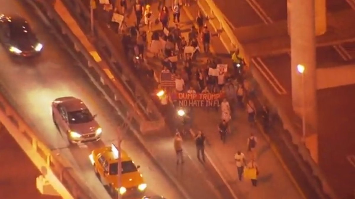 #NotMyPresident protesters march on Biscayne Boulevard, MacArthur -- now I-95 NB  fw.to/wQYmepk?utm_me… https://t.co/O62K670VBq