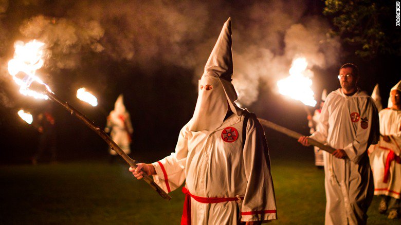CNN's tweet photo. North Carolina GOP condemns KKK parade honoring President-elect Donald Trump https://t.co/V2XqV8wExN https://t.co/xLlCG3bkfX