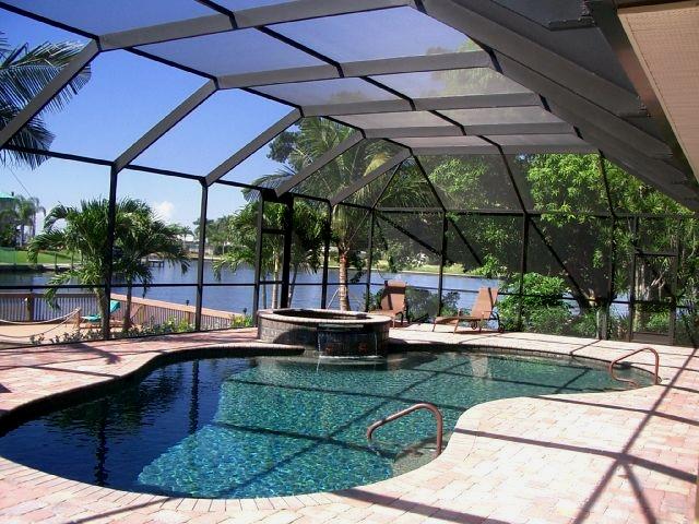 ScreenSolution_'s tweet image. Pool with Lanai plus outdoor kitchen space