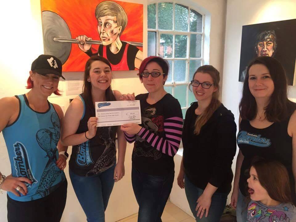 FemmesOfTheFens's tweet photo. The @lincsbombers presenting us with our cheque! Thank you for working so hard to raise proceeds for our cause - you are great role models! https://t.co/E4uXjRrs13