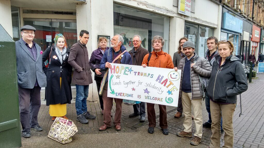 Event today: c 25 people, no rain, funky sign &amp; talking about holding alternative presidential inauguration, with marching band, in Jan.
