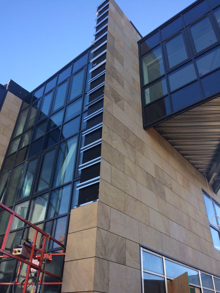 Natural stone rainscreen at Sunderland uni looks great.....project delivered early by #teamsroofing
