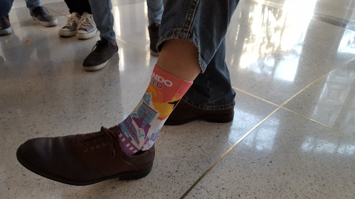 orlandomayor's tweet photo. Getting ready for the @OrlandoPride parade. The perfect day to wear my @RockEmApparel #OrlandoUnited socks. https://t.co/NnBwVi8CQX