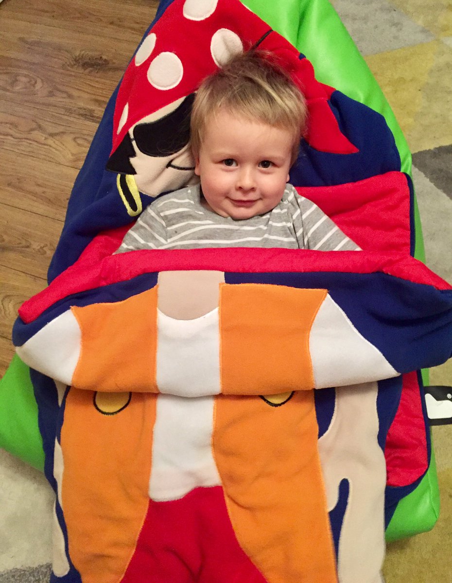 Catherine212's tweet photo. What more could you need? A #beanbagcrazy beanbag and a pirate @SnuggleSac to cuddle up and watch #peppapig https://t.co/bHvYTmhQj8