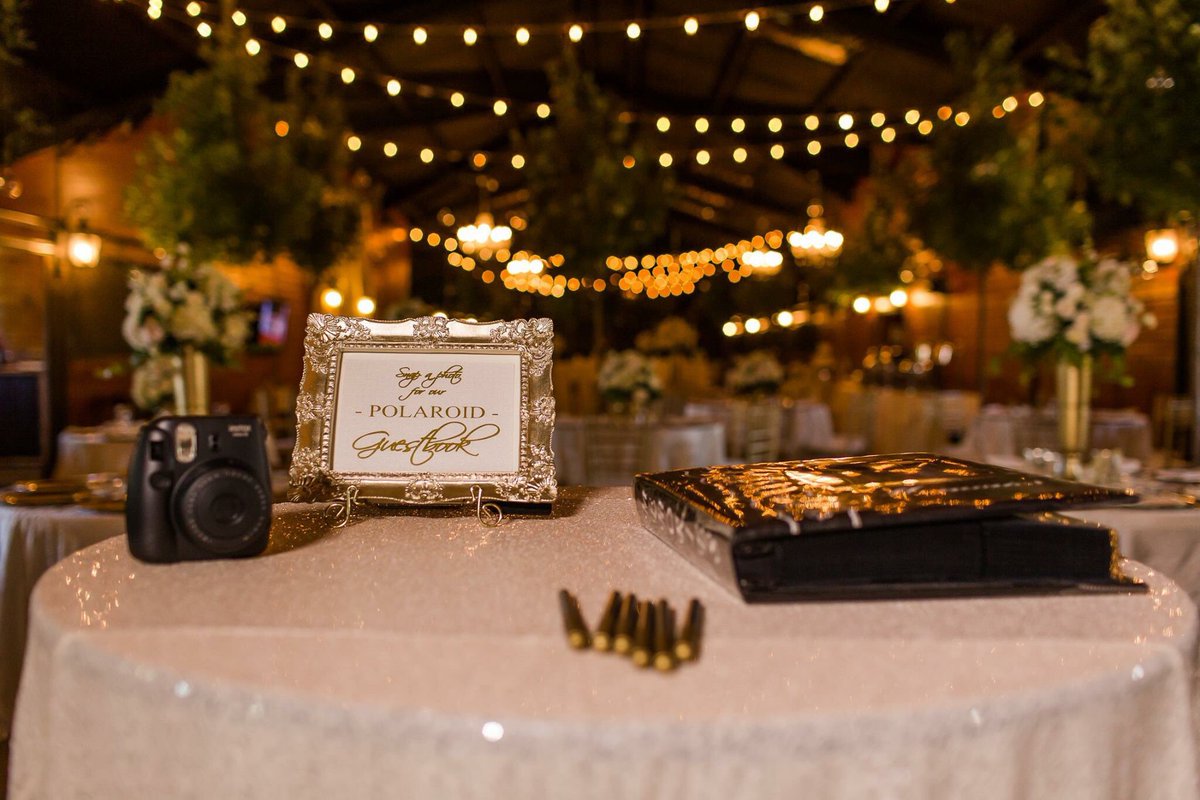 OconeeEvents's tweet photo. Cocktail table used for a unique guest book. Each guest took a picture with a polaroid camera, signed it, and then put it in a memory book👌🏼 https://t.co/at31DjfBv4