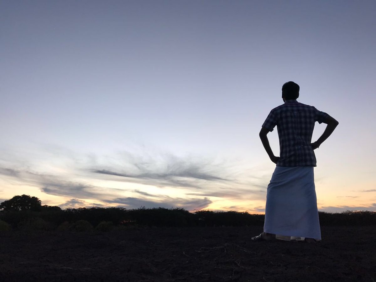 VidyuRaman's tweet photo. My director @dhanushkraja lost in thoughts 🤔 #PowerPaandi #NoFilter #NoPollution #VillageLife https://t.co/VO0cHHAJt0
