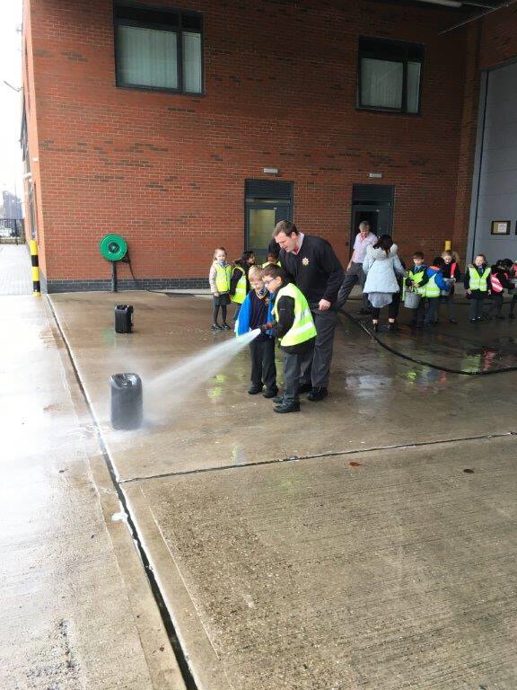 OLCAFenton's tweet photo. Putting the fire out #buddingfirefighters https://t.co/PNeK18jRpP