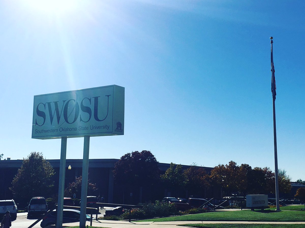swosu's tweet photo. Yes, there is a flag on the pole! 80 degrees, no wind, trees changing colors, sun rays reflecting on a special place &amp; it's Nov.15.  SWOSU! https://t.co/oFzPD0zQaw