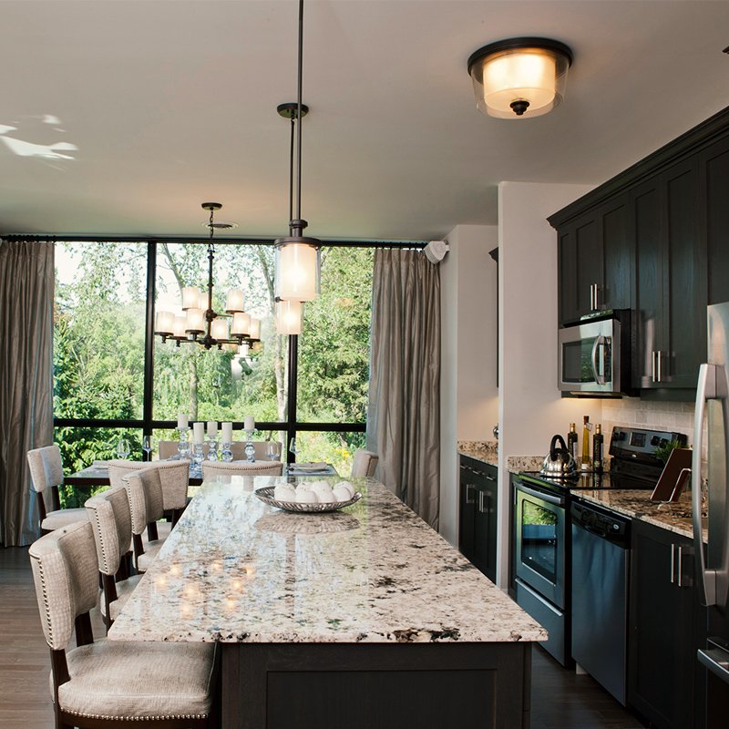 CortelGroup's tweet image. Our #modelsuite showcasing the use of light and dark contrast. The pop of cream prevents the grey cabinetry from overpowering the #design.