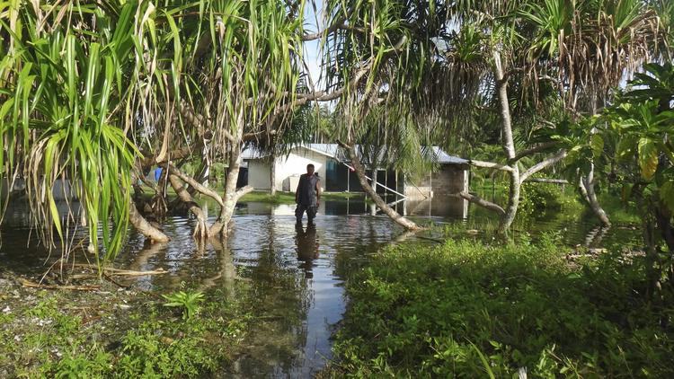 latimes's tweet photo. One looming consequence of climate change: Small island nations will cease to exist https://t.co/WEKzOIgKMS https://t.co/Kh5tJJpcaL