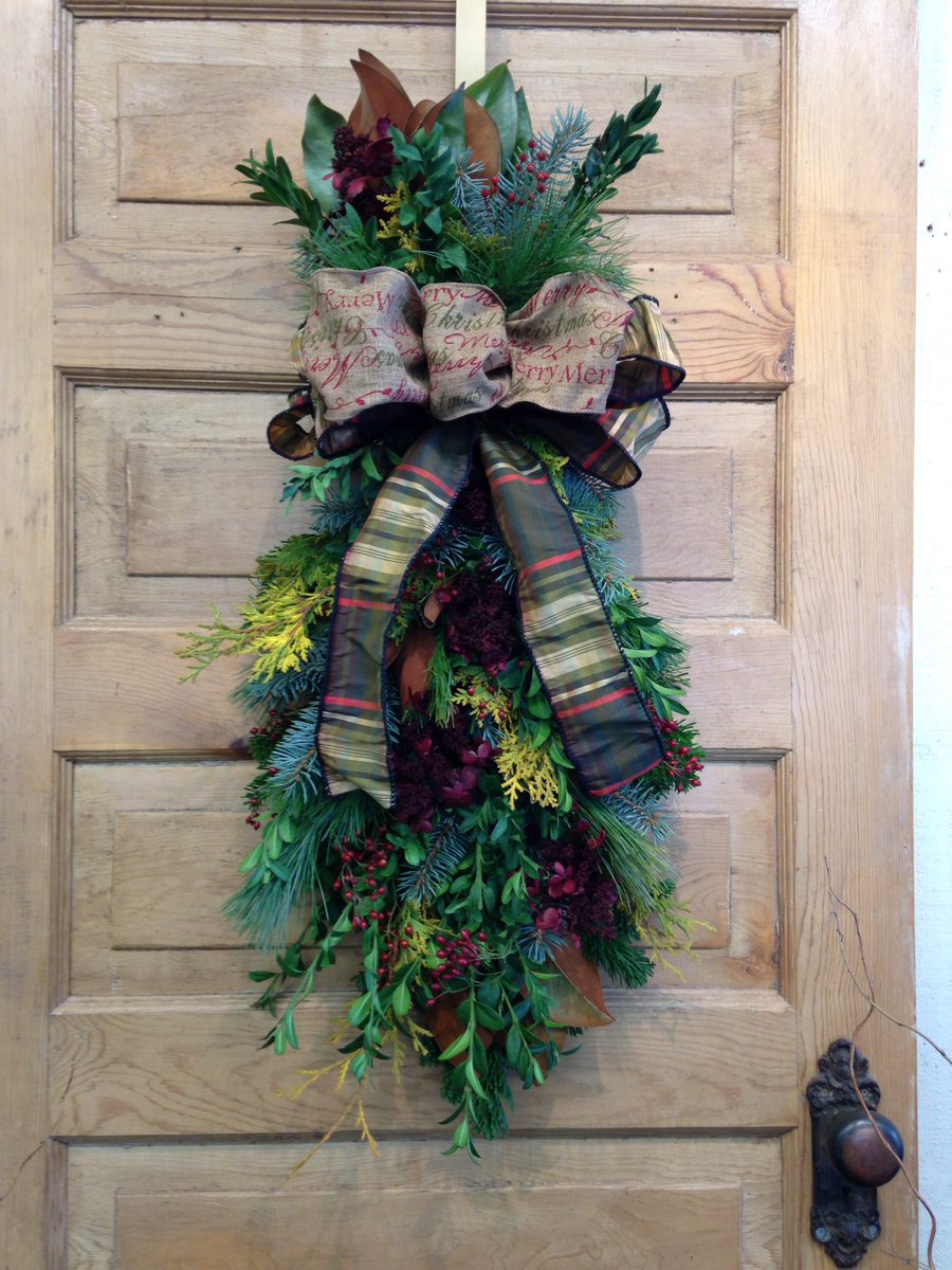 Not a wreath fan?  How about a natural door swag? #doordecor #fresh #greens #natural