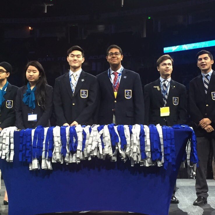syossetdeca's tweet photo. #DECAMonth Day 16: Alum, Justin Kang and former president, Arjun rocking their DECA Blazers on stage at #ICDC2016 #OwnYourFuture @decainc https://t.co/JfEfbFbbOA