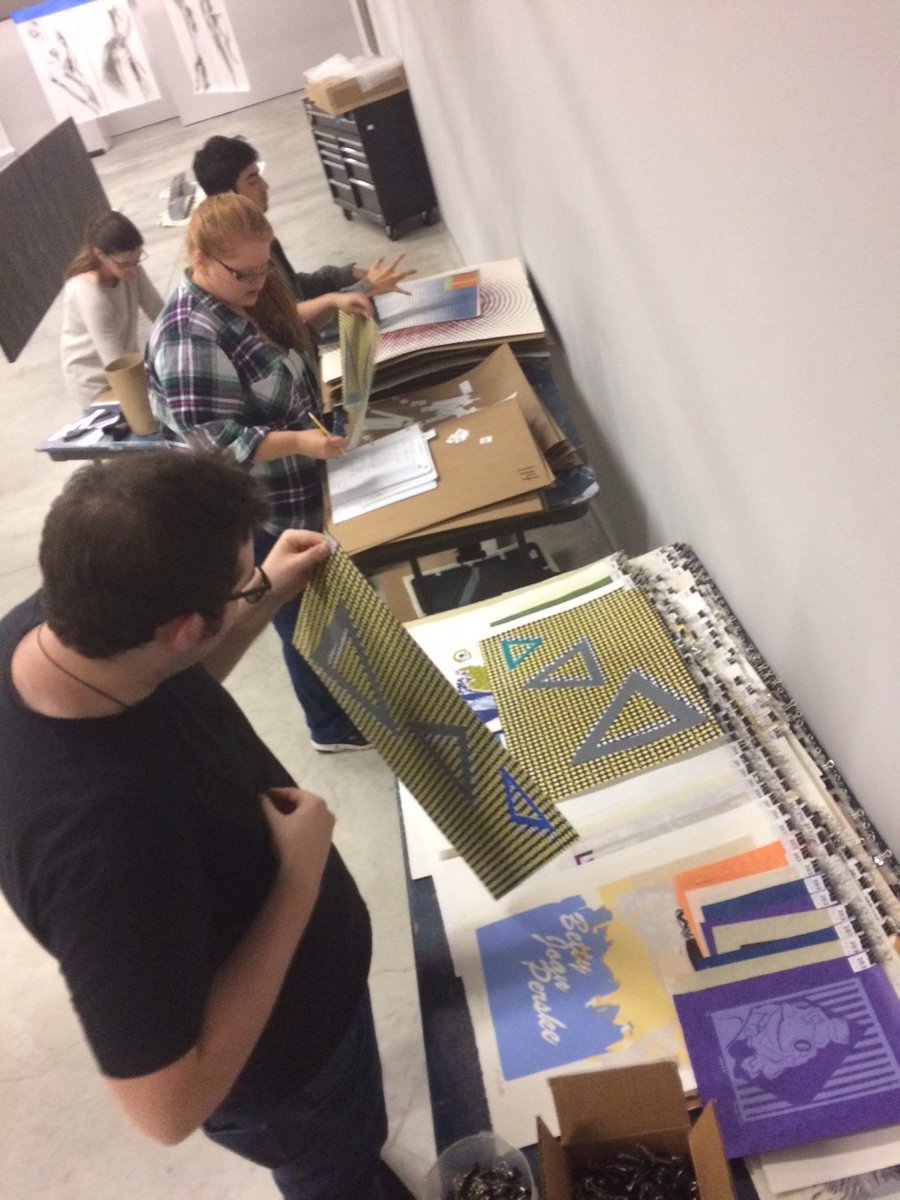 Dedicated students Nic, Ashley &amp; Hayden cataloging prints for Hot off the Press sale <a href="/georgiancollege/">Georgian College</a> tomorrow!