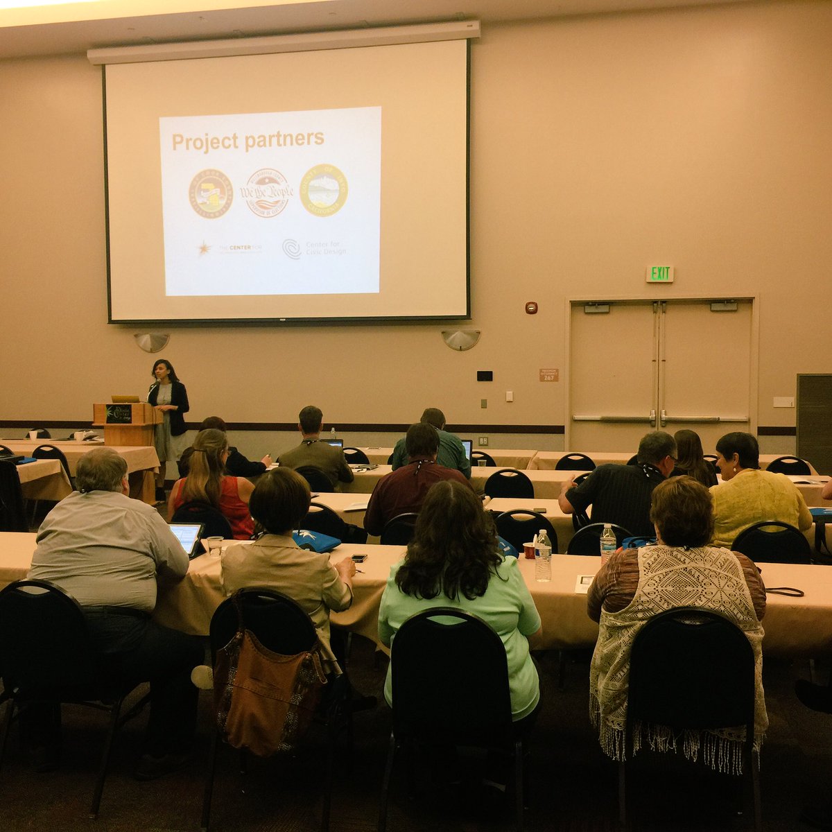 Tiana speaks to the group about our primary project partners for the Toolkit