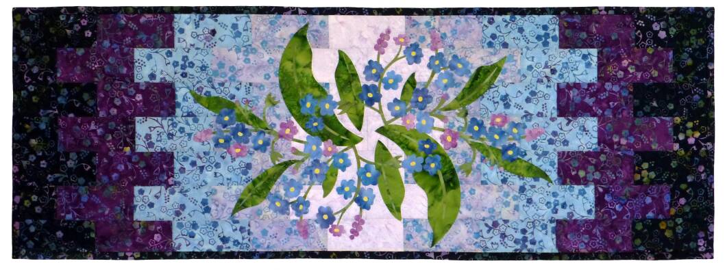 WildfireAK's tweet photo. Forget Me Not. New tablerunner pattern using my signature batik line, available Jan 2017. https://t.co/pgTs97ucPa
