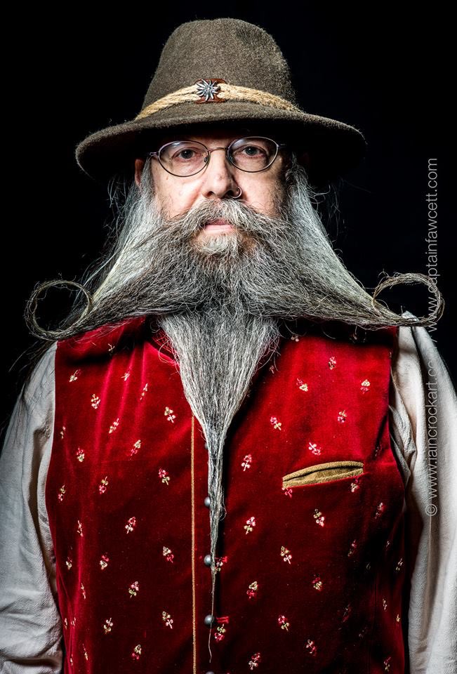 Charlie Saville of Essex #beards #BeardTweet #TBBClub #fullbeard #freestylebeard Category Champion 1stPlace #loops #spike #redwaistcoat #hat