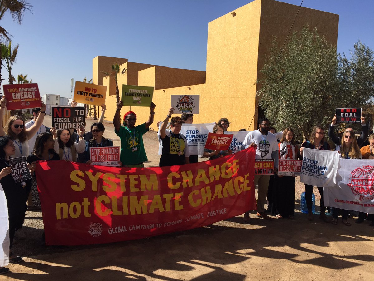 JesseBPress's tweet photo. The people demand an end to dirty energy. It's time for coal to die! #SystemChangeNotClimateChange #BigPollutersOut #COP22 https://t.co/YqKdr09XOm