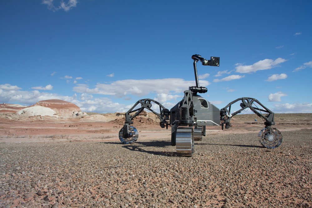 DFKI's tweet photo. Impressive research: Rover SherpaTT in Utah is remote-controlled via exoskeleton from far away DFKI in Bremen @ft_utah https://t.co/tpPEDLM6aQ