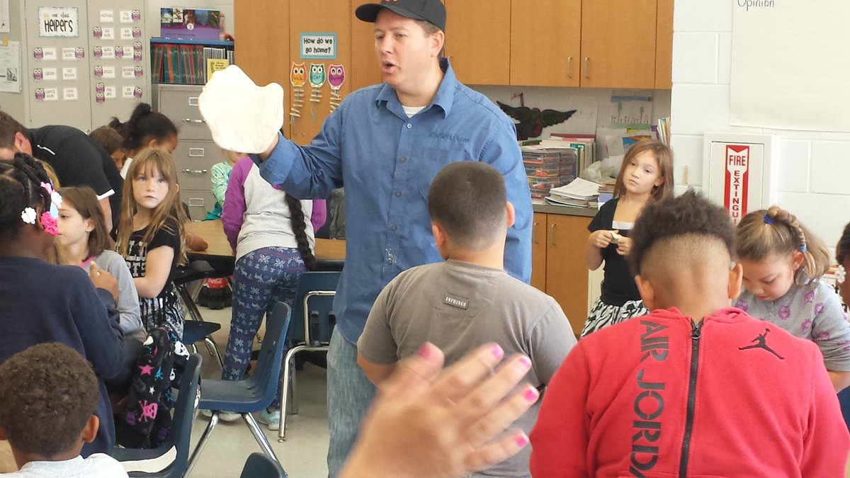 MrsRadjeski's tweet photo. Making pizzas with Mr. Joe from @MyCicis! @HCPSLanier #HCPSTeachIn https://t.co/rsZdVQIFup