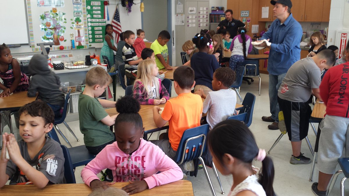 MrsRadjeski's tweet photo. Making pizzas with Mr. Joe from @MyCicis! @HCPSLanier #HCPSTeachIn https://t.co/rsZdVQIFup