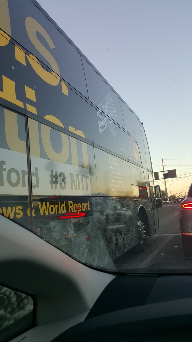 PhysicsNate's tweet photo. When you're driving and the spacecraft you work on is on the side of a bus #priceless #LunaHMap https://t.co/SfCrdJe7iD