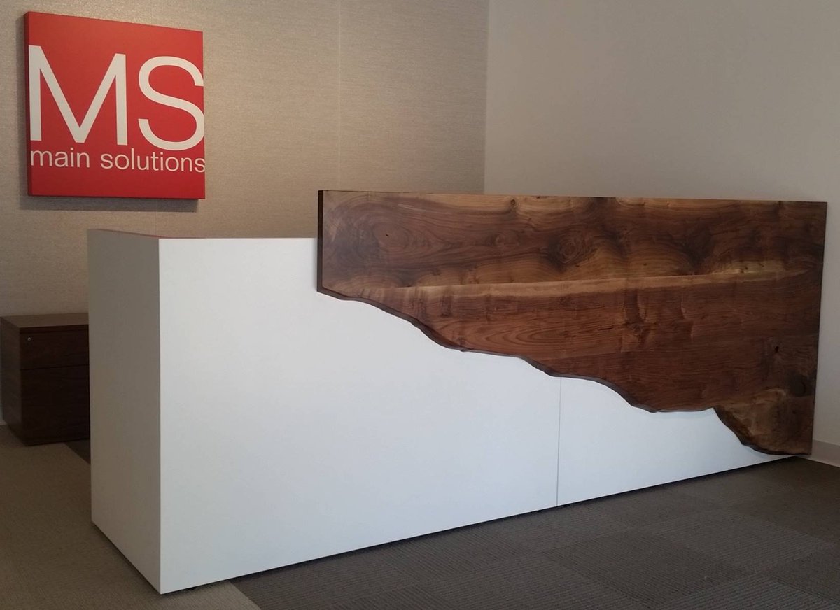 CreativeWoodCW's tweet photo. Bringing your #DesignsToLife. Reception desk with live edge detail, seen in the Main Solutions showroom in Atlanta. #interiordesign https://t.co/GePvi3hOZv