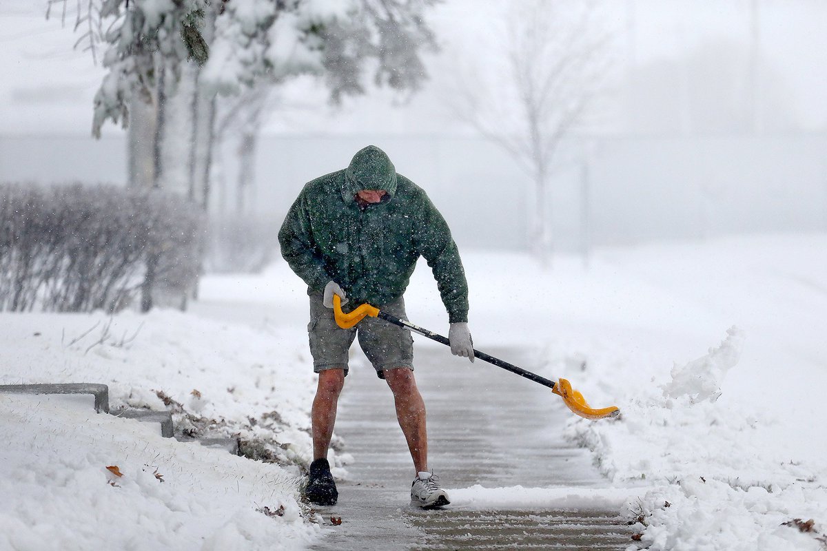 Hardy souls, Minnesotans are. Shoveling in shorts in St. Cloud. Photo by @floresliz12